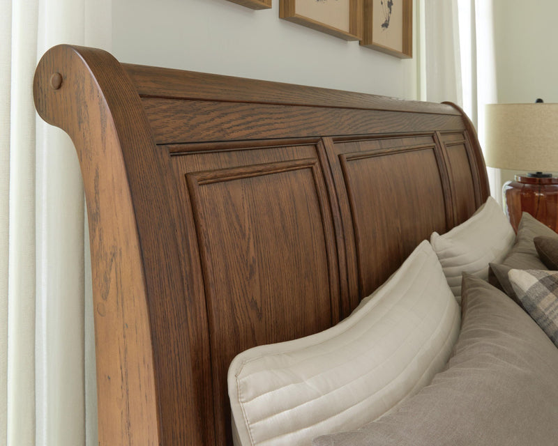 Zackaryn - King Sleigh Storage Bed - Warm Brown