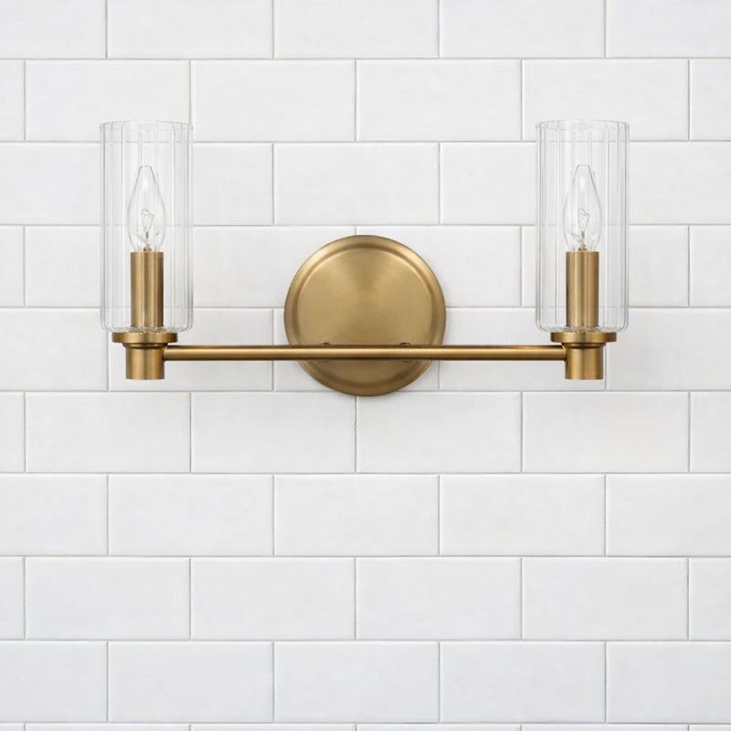 Regal - Double Light Vanity With Clear Ribbed Satin - Antique Brass / Clear